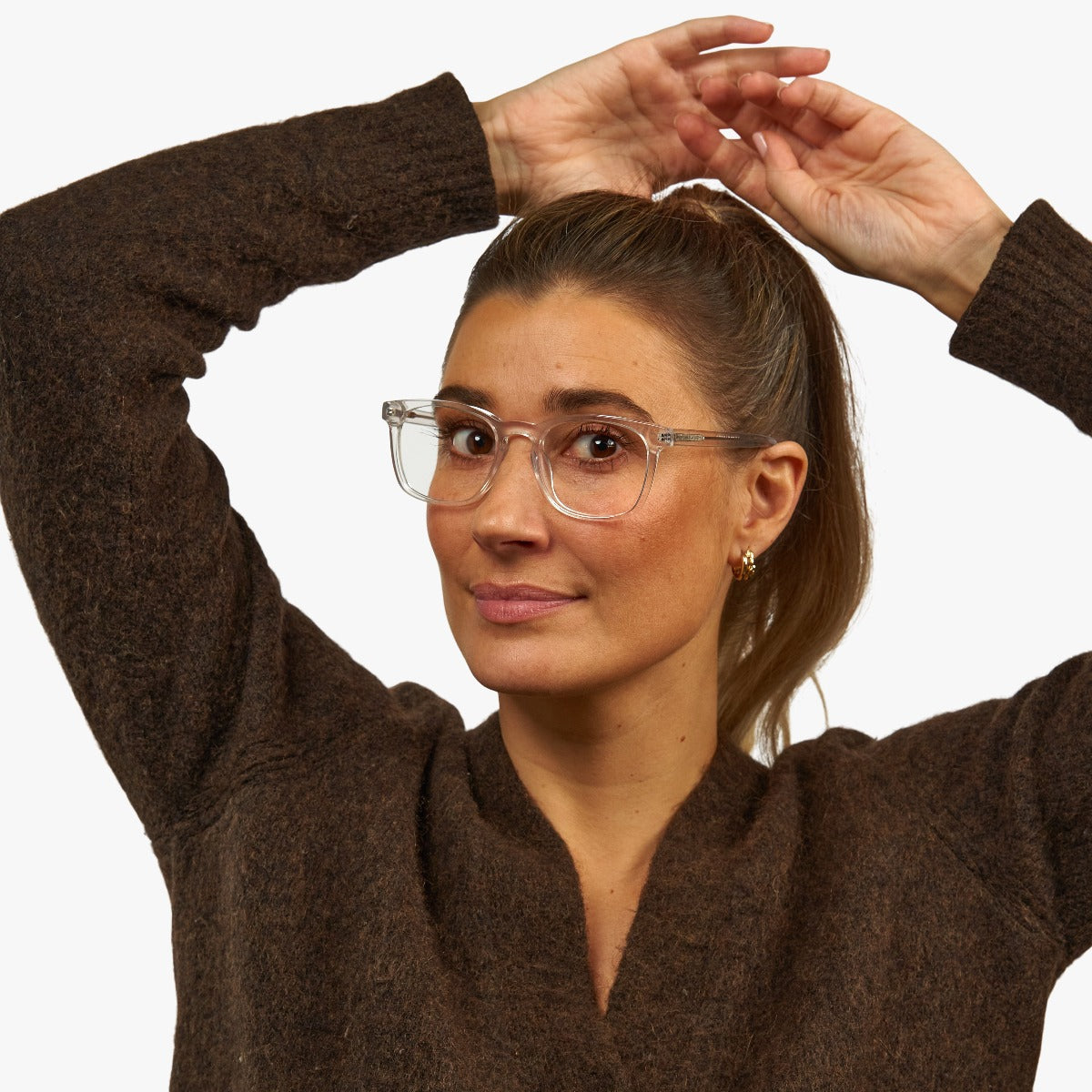 Person wearing Bornholm Crystal White reading glasses