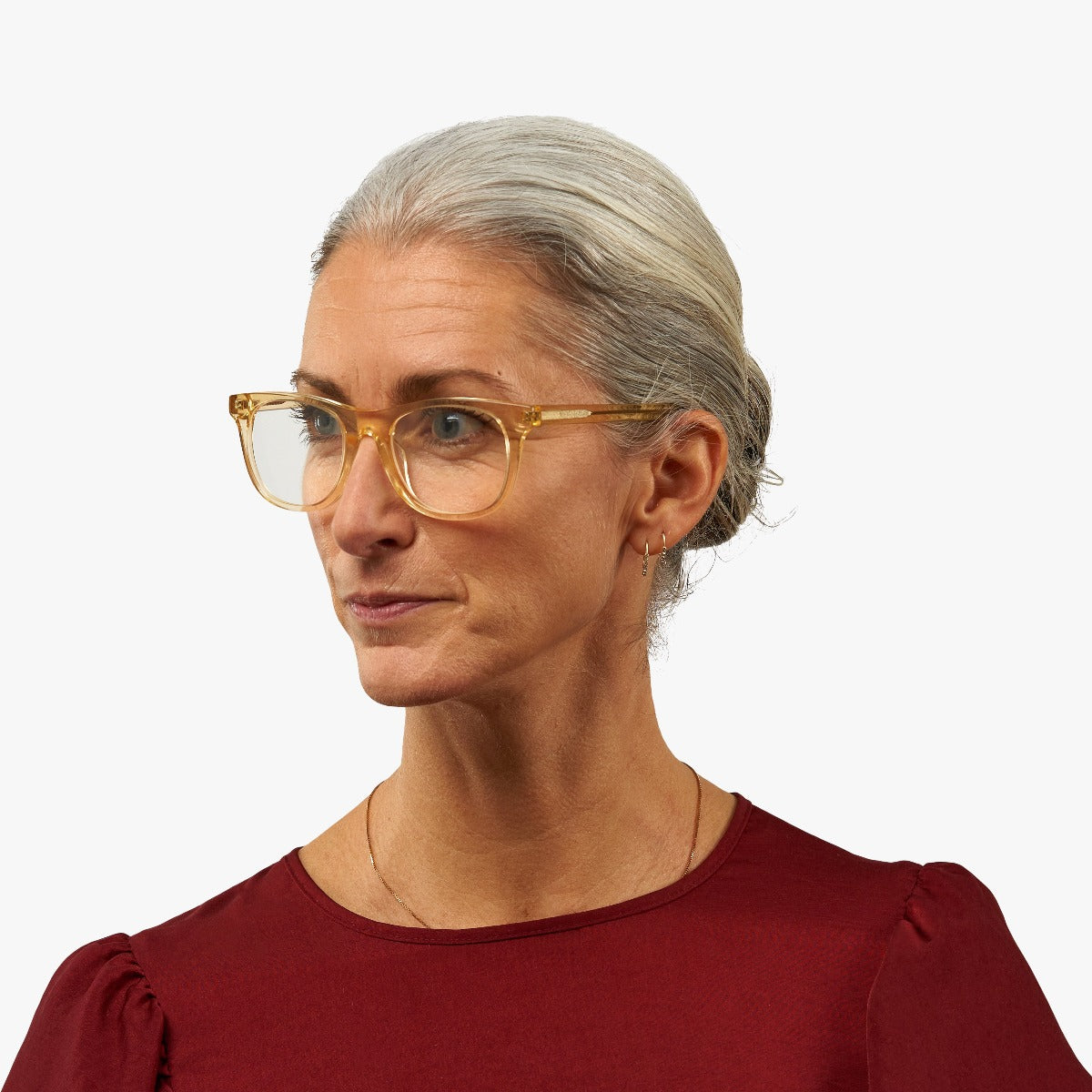 Person wearing square crystal lemon glasses