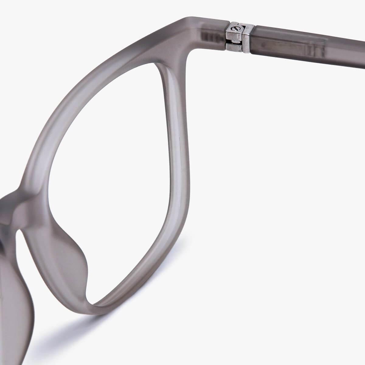 Close-up of Men's Fyn Grey eyeglasses with a sleek transparent frame