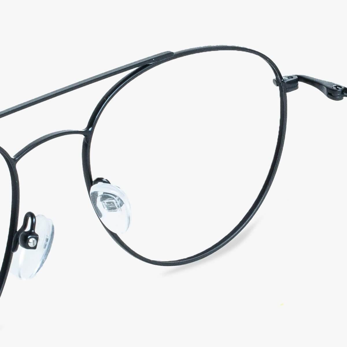 Black metal round eyeglasses frame close-up