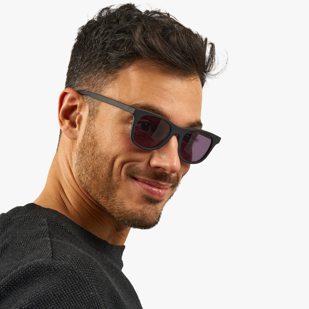 Person wearing Men's Malmö Black sunglasses with dark lenses