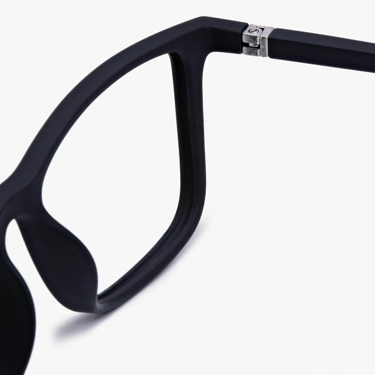 Close-up of black Skagen eyeglass frame hinge