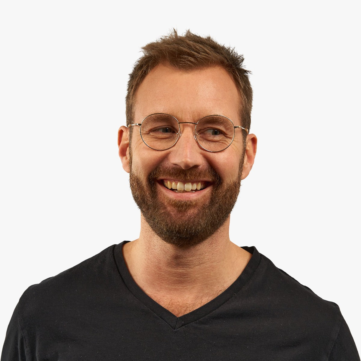 Person wearing Men's Tromsø Gold round reading glasses