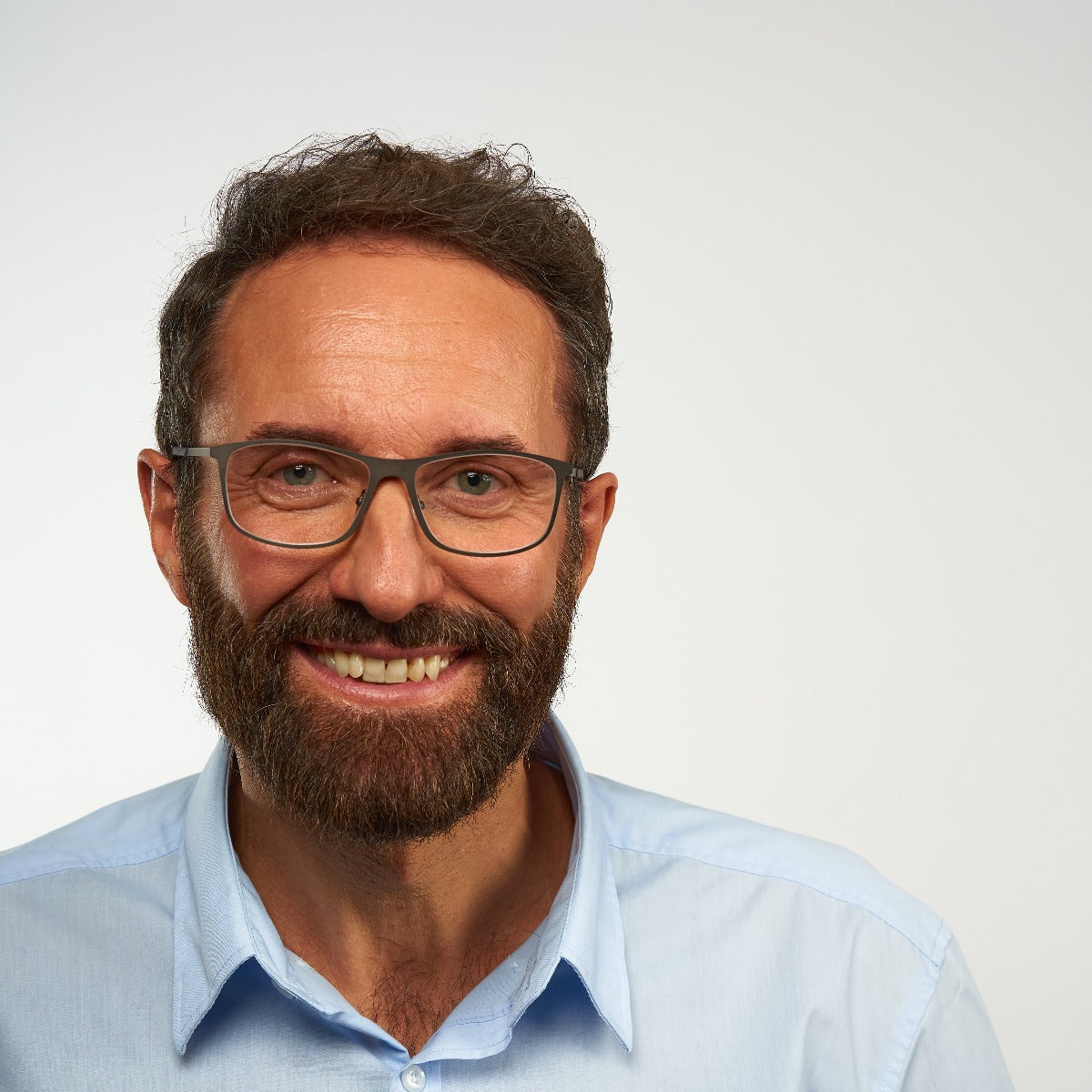 Person wearing Skagen Black glasses with metal frame