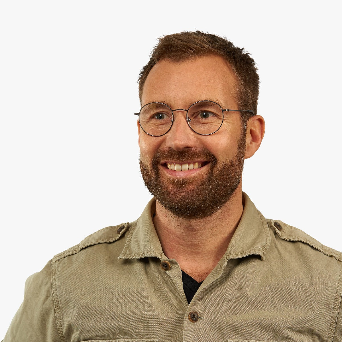 Person wearing round eyeglasses