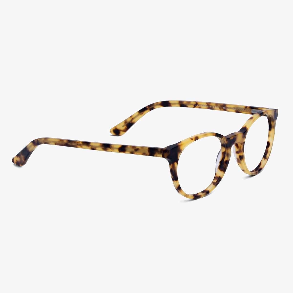 Tortoiseshell patterned eyeglasses with round frames