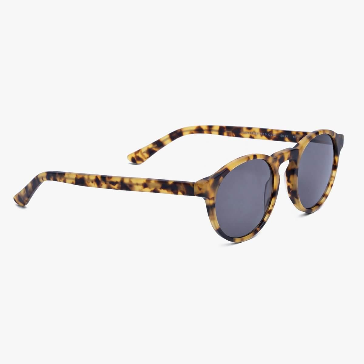 Tortoise round sunglasses with dark lenses